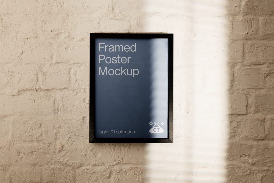 Wall-mounted framed poster mockup on textured background, ideal for presenting art and design work to clients, editable PSD, modern look.